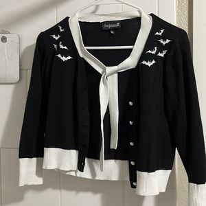It's freakin' bats on a cardigan!
